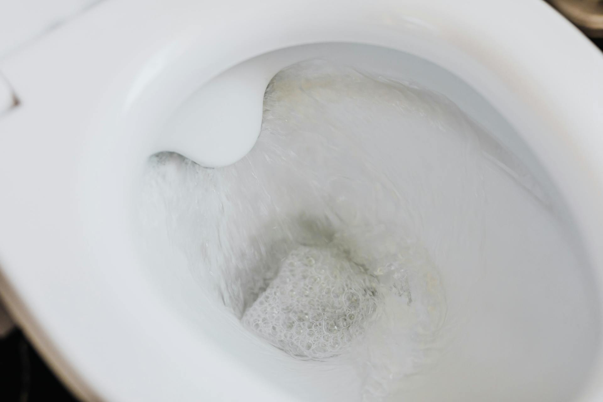 toilet flushing water