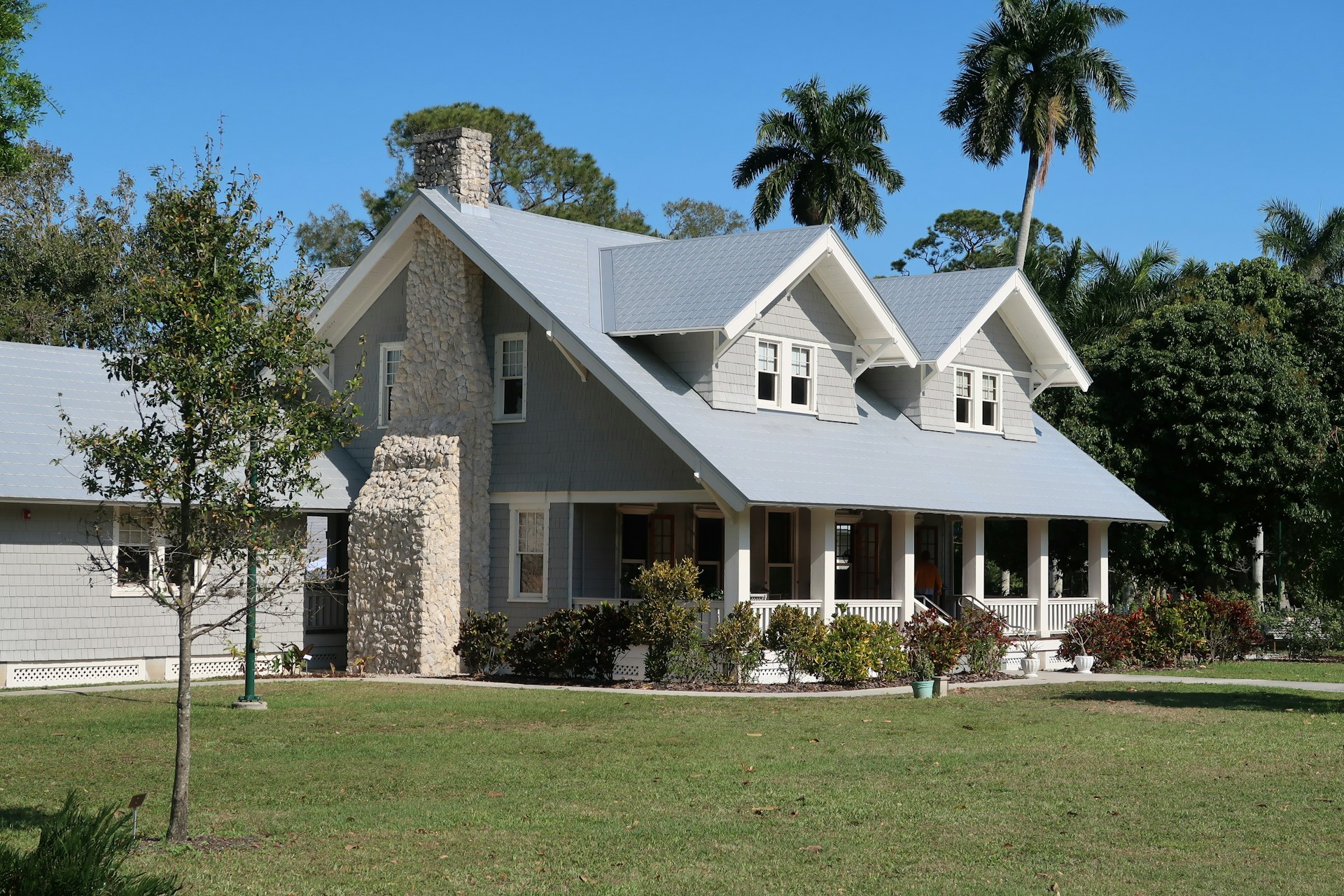 older Tampa Bay home with palm trees