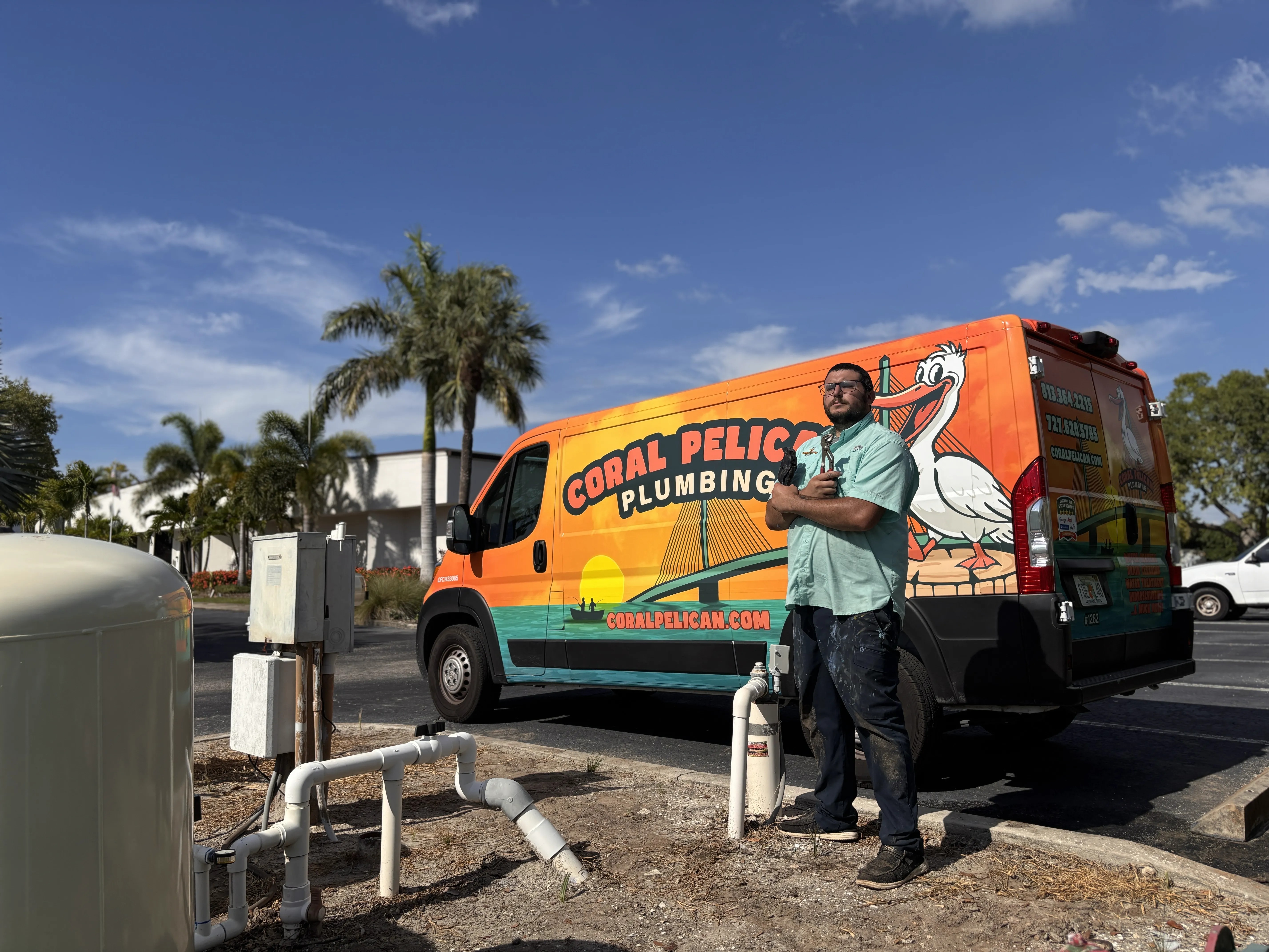 Coral Pelican technician standing in front of truck
