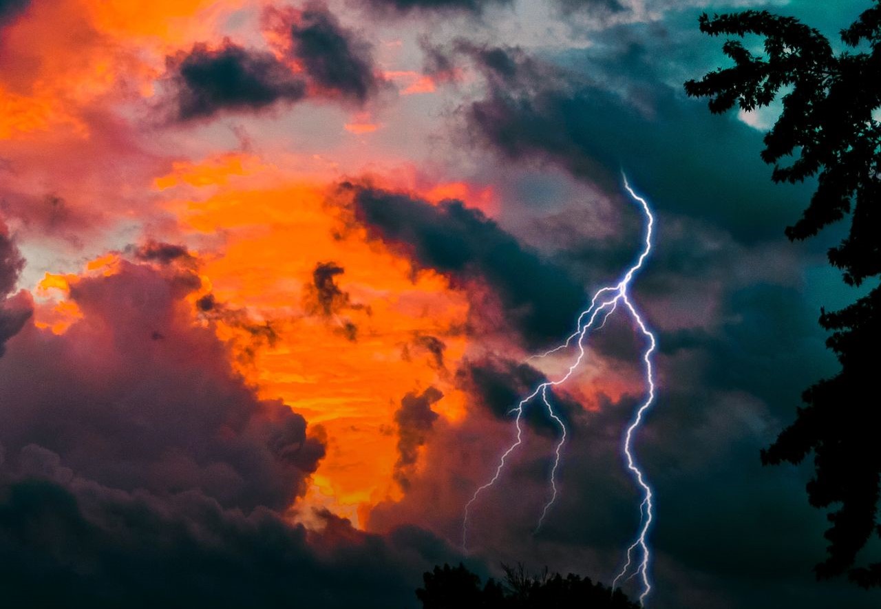 lightning coral skies and dark clouds