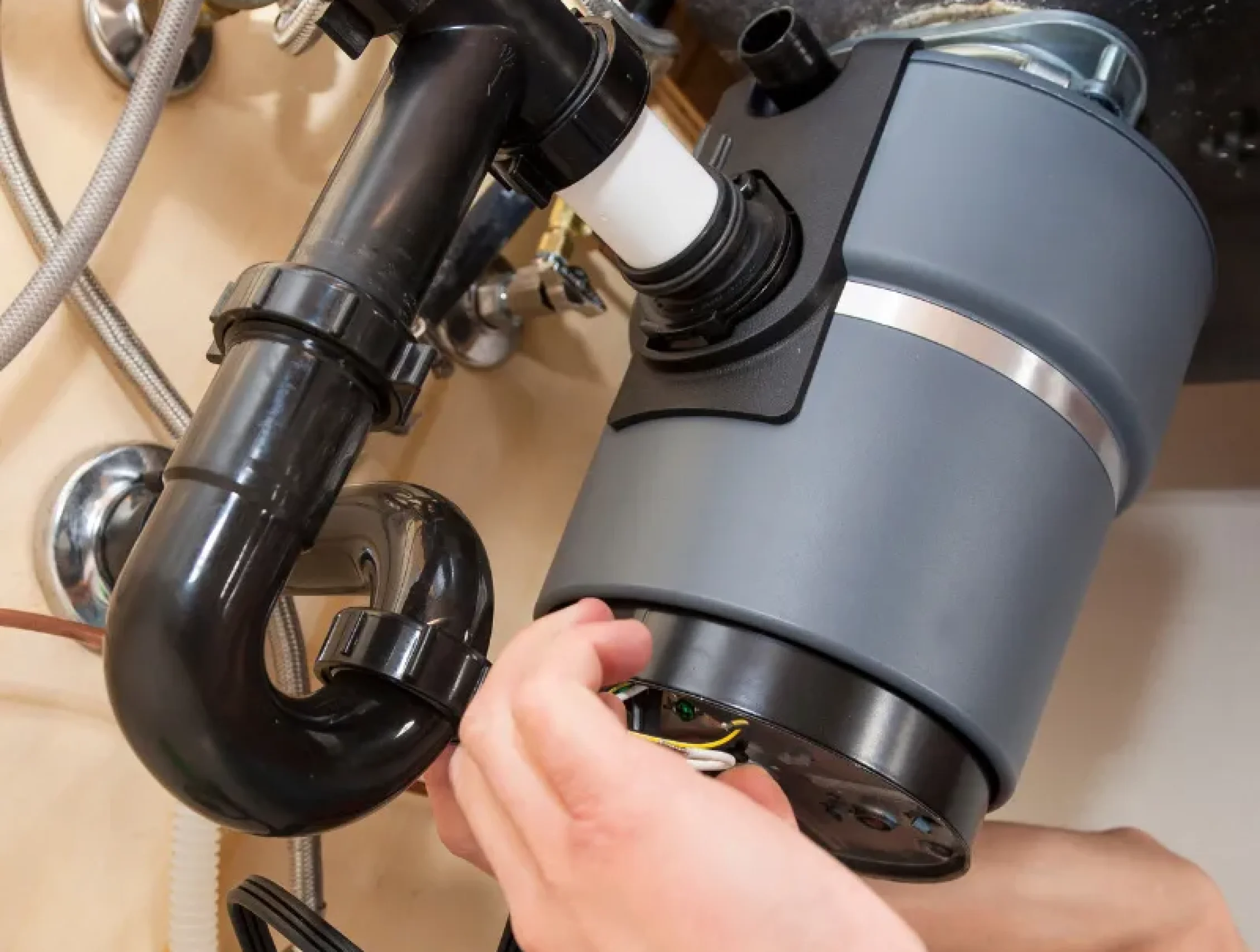 garbage-disposal-being-repaired